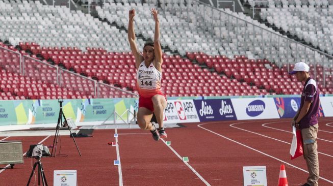 Atlet lompat jauh Maria Natalia Londa di test event Asian Games 2018, (11/2).(Suara.com/Kurniawan M)