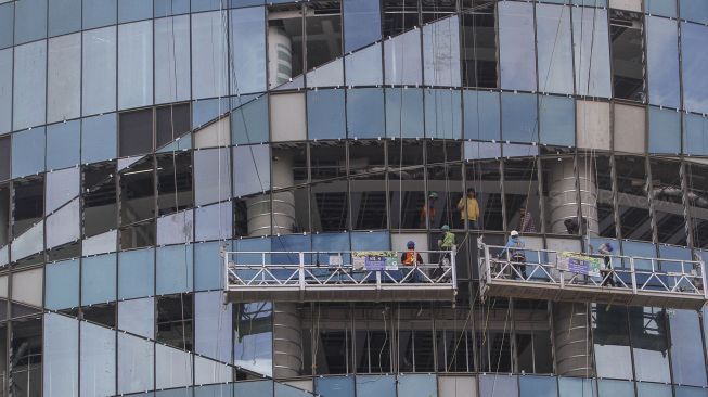 Proyek pembangunan gedung di Jakarta, Rabu (14/2).