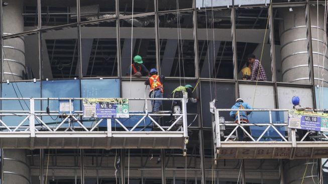 Proyek pembangunan gedung di Jakarta, Rabu (14/2).