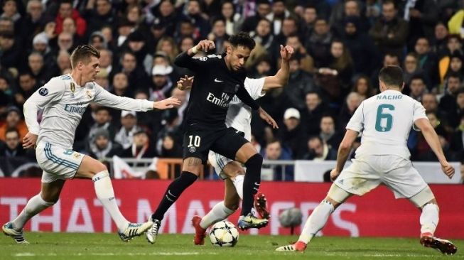 Pemain PSG Neymar dikepung tiga pemain Real Madrid [AFP]