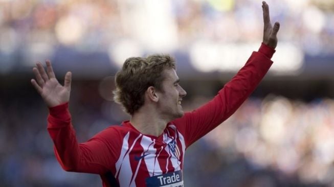 Pemain Atletico Madrid Antoine Griezmann cetak satu gol ke gawang Copenhagen, (16/2). (AFP)