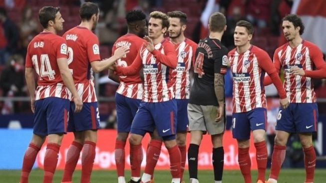 Para pemain Atletico Madrid meraih kemenangan atas Athletic Bilbao di Wanda Metropolitano stadium. GABRIEL BOUYS / AFP