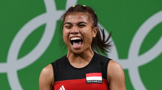 Lifter putri Indonesia, Sri Wahyuni Agustiani. (AFP)