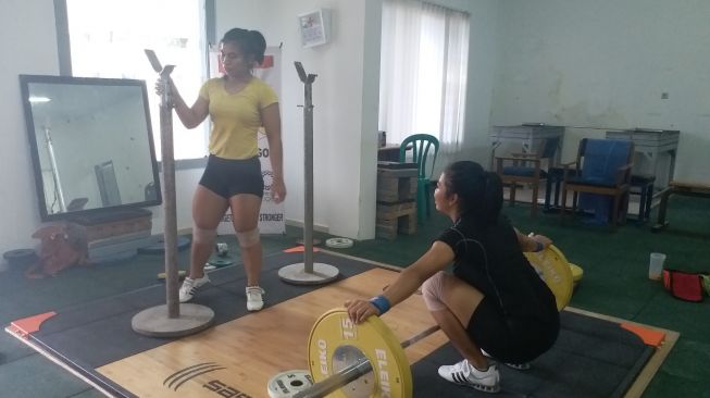 Lifter putri Indonesia, Sri Wahyuni Agustiani. (suara.com/Pebriansyah Ariefana)