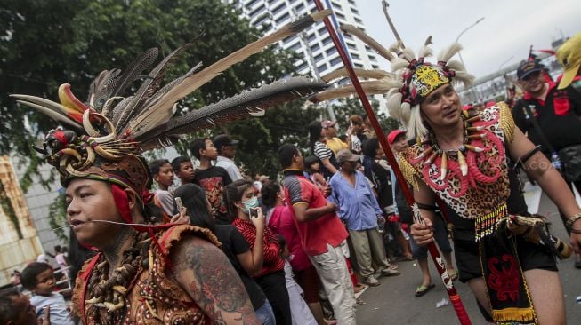 Karnaval Nusantara Cap Go Meh 2018 berlangsung di kawasan Glodok, Jakarta, Minggu (4/3/2018) [Suara.com/Kurniawan Mas'ud]