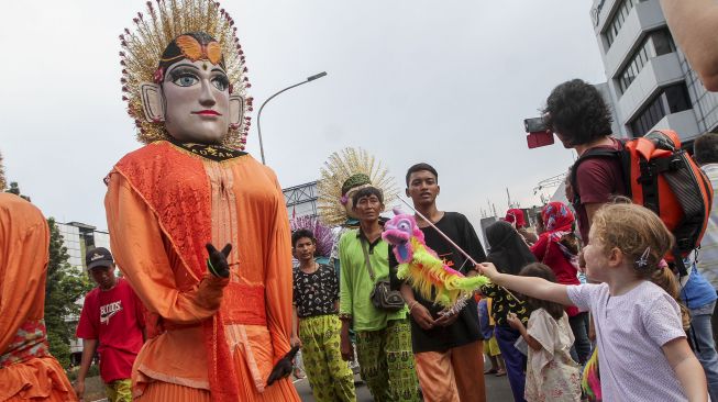 Karnaval Nusantara Cap Go Meh 2018 berlangsung di kawasan Glodok, Jakarta, Minggu (4/3/2018) [Suara.com/Kurniawan Mas'ud]