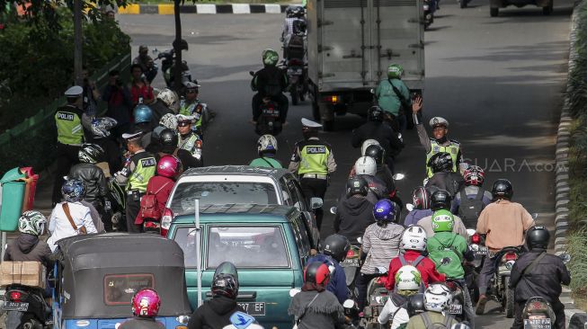 Operasi Keselamatan Jaya 2018 di Jalan Letjen Suprapto, Jakarta, Senin (5/3). 