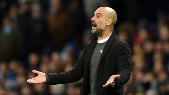 Pakai Pita Kuning Guardiola Didenda oleh FA