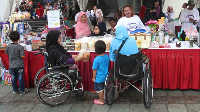 Koalisi perempuan penyandang disabilitas merayakan Hari Perempuan Internasional 2018 di Taman Ismail Marzuki, Jakarta, Kamis (8/3). 