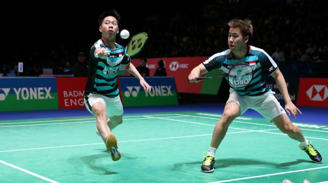 Pasangan ganda putra Indonesia, Kevin Sanjaya Sukamuljo/Marcus Fernaldi Gideon saat tampil di babak pertama All England 2018 BWF World Tour Super 1000, Rabu (14/3/2018). [Humas PBSI]