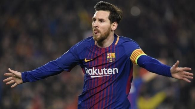 Bintang Barcelona Lionel Messi merayakan golnya ke gawang Chelsea di Camp Nou. LLUIS GENE / AFP 