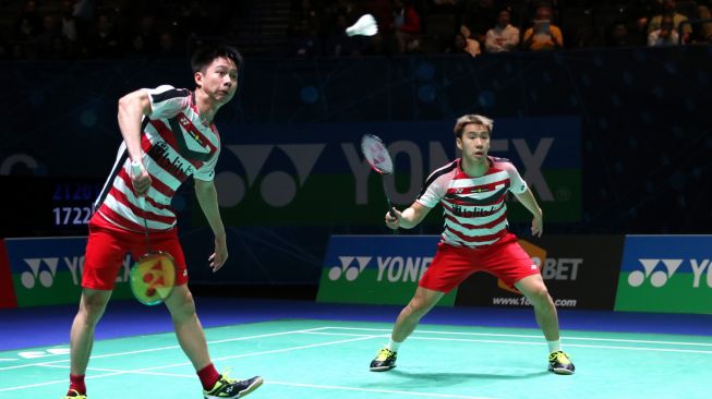 Pasangan ganda putra Indonesia, Kevin Sanjaya Sukamuljo/Marcus Fernaldi Gideon, di babak kedua All England 2018, Kamis (15/3). [Humas PBSI]