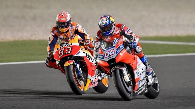 Andrea Dovizioso (kanan) dan Marc Marquez (foto: laman resmi MotoGP)