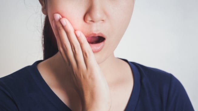 Ilustrasi sakit gigi, radang gusi. (Shutterstock)