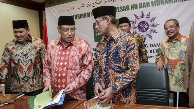 Ketua Umum Pengurus Besar Nahdlatul Ulama (PBNU) KH. Said Aqil Siradj menerima kunjungan ketua Umum PP Muhammadiyah KH. Haedar Nashir dalam acara silaturahmi di Gedung PBNU Jakarta, Jumat (23/3).