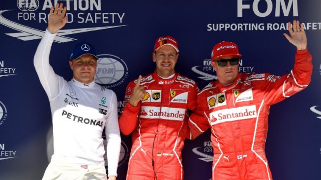 (Dari kiri): Valtteri Bottas (Mercedes), Sebastian Vettel (Ferrari), dan Kimi Raikkonen (Ferrari). [AFP/Andrej Isakovic]