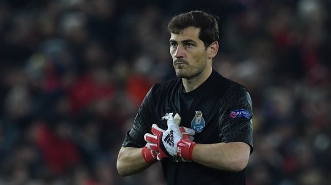 Kiper Porto Iker Casillas. PAUL ELLIS / AFP