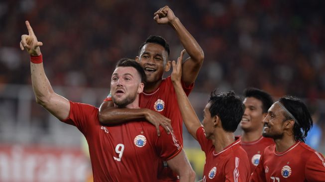 Para pemain Persija Jakarta merayakan gol Marko Simic ke gawang Johor Darul Ta'zim (JDT) dalam laga lanjutan Piala AFC di SUGBK. ANTARA FOTO/Akbar Nugroho Gumay