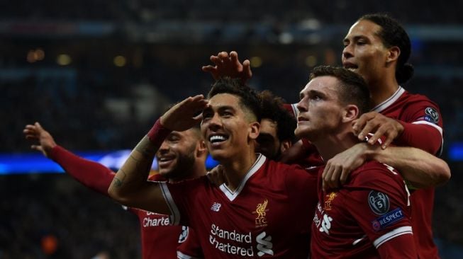 Pemain Liverpool Roberto Firmino rayakan golnya ke gawang City [AFP]