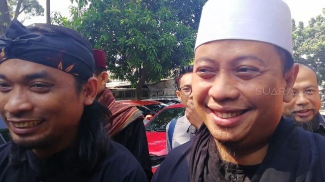 Opick saat menghadiri sidang perceraian di Pengadilan Agama Jakarta Timur, Rabu (11/4/2018) [suara.com/Ismail]