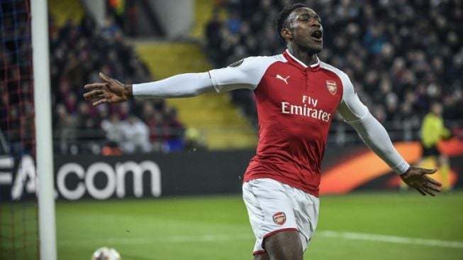 Penyerang Arsenal, Danny Welbeck merayakan golnya ke gawang CSKA Moscow dalam leg kedua perempat final Liga Europa yang berkesudahan dengan skor 2-2 di VEB Arena, Moskow, Rusia, Kamis (12/4/2018). [AFP/Alexander Nemenov]