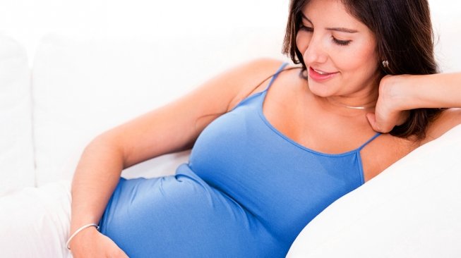 Ilustrasi ibu hamil menjalani kehamilan trimester pertama.