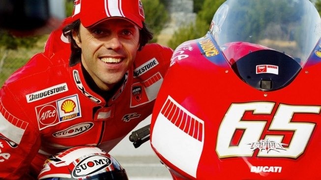 Loris Capirossi saat masih membalap bersama Ducati. [AFP/Cesar Rangel]