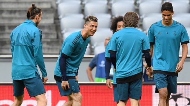 Cristiano Ronaldo dan pemain Real Madrid lainnya melakukan sesi latihan sebelum menghadapi Bayern Munich. Christof STACHE / AFP