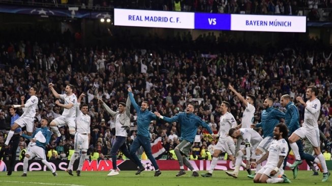 Pemain Real Madrid rayakan keberhasilan mereka melaju ke final Liga Champions usai bermain imbang 2-2 kontra Bayern Munich di Santiago Bernabeu, Rabu (2/5/2018) [AFP]