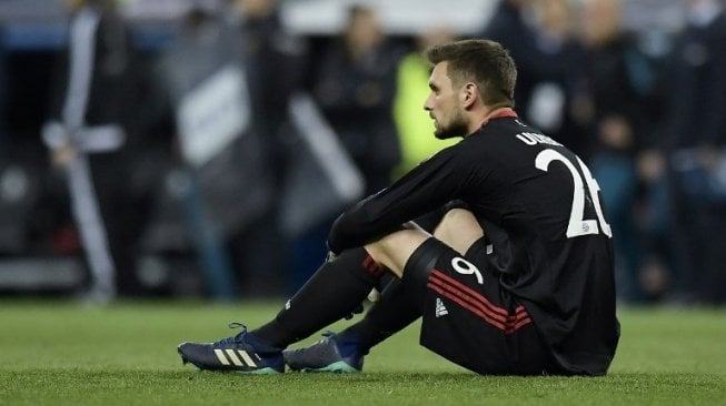 Penjaga gawang Bayern Munich Sven Ulreich terlihat kecewa usai timnya disingkirkan Real Madrid di semifinal Liga Champions [AFP]