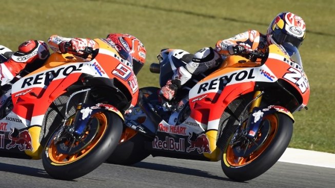 Duet pebalap Repsol Honda, Marc Marquez dan Dani Pedrosa. [AFP/Jose Jordan]