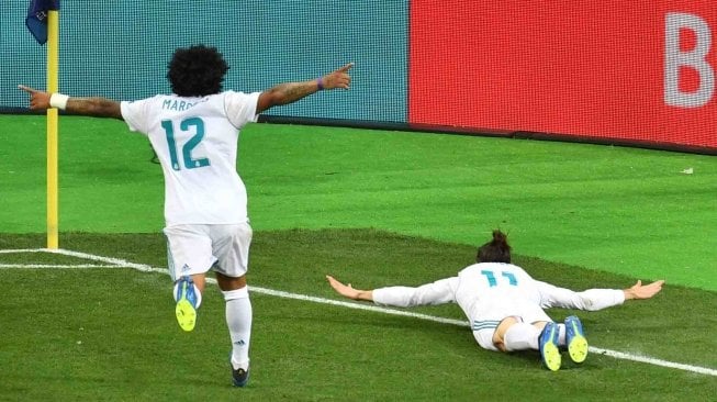 Ekspresi gol winger Real Madrid Gareth Bale dalam pertandingan Real Madrid vs Liverpool di final Liga Champions, di Stadion NSK Olimpiyskiy, Kiev, Minggu (27/5).