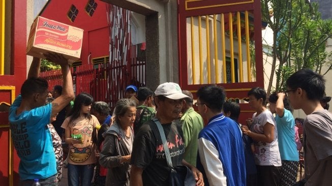 Pengemis di Vihara Dharma Bhakti, Glodok, Jakarta Barat.(Suara.com/Argo)