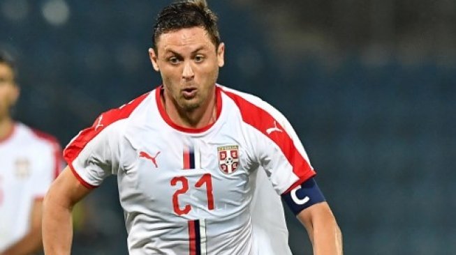 Gelandang andalan Timnas Serbia, Nemanja Matic (JOE KLAMAR / AFP)