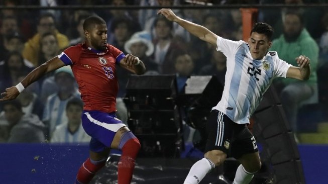 Penyerang Timnas Argentina, Cristian Pavon (kanan) (Alejandro PAGNI / AFP)