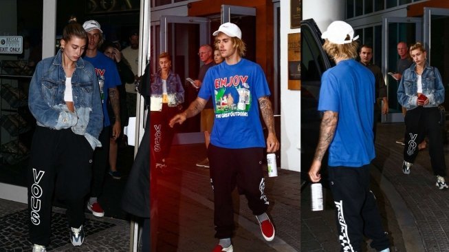 Justin Bieber dan Hailey Baldwin di Miami (11/6) [@BiebernewsHQ/twitter].