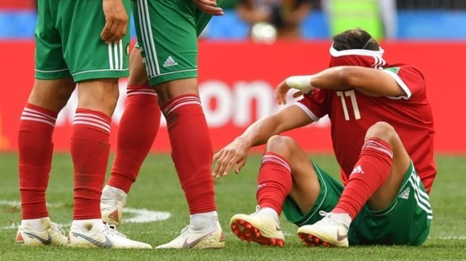 Reaksi pemain Maroko setelah ditumbangkan Portugal di laga kedua Grup B Piala Dunia 2018 yang berlangsung di Stadion Luzhniki, Rabu (20/6/2018) [AFP]