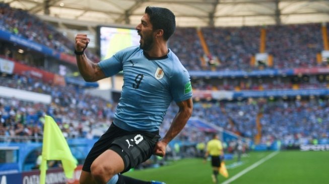 Pemain Uruguay Luis Suarez rayakan golnya ke gawang Arab Saudi di Rostov Arena, Rabu (20/6/2018) [AFP]