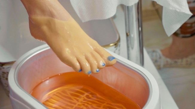 Perawatan kaki dengan menggunakan parafin wax. (Shutterstock)