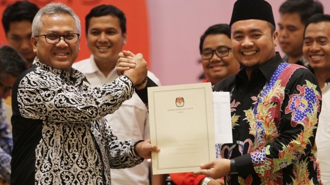 Ketua Komisi Pemilihan Umum (KPU) Arief Budiman didampingi para Komisioner KPU mengikuti rapat pleno terbuka Rekapitulasi Daftar Pemilih Sementara Pemilu (DPS) 2019 di Jakarta, Sabtu (23/6/2018). [Suara.com/Oke Atmaja]