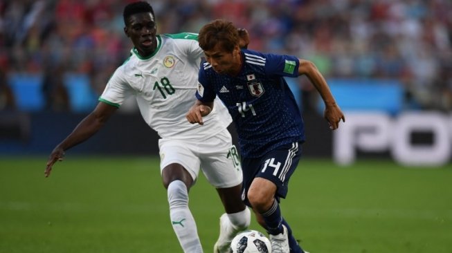 Jepang vs Senegal. (JORGE GUERRERO / AFP)