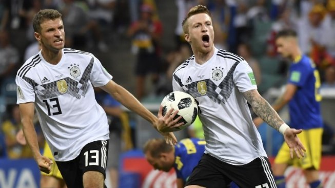 Pemain Jerman Marco Reus merayakan golnya ke gawang Swedia. Nelson Almeida / AFP