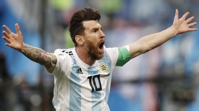Bintang Argentina Lionel Messi merayakan golnya ke gawang Nigeria. Fatih Akta/Anadolu  
