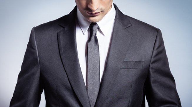 Ilustrasi lelaki memakai jas. (Shutterstock)
