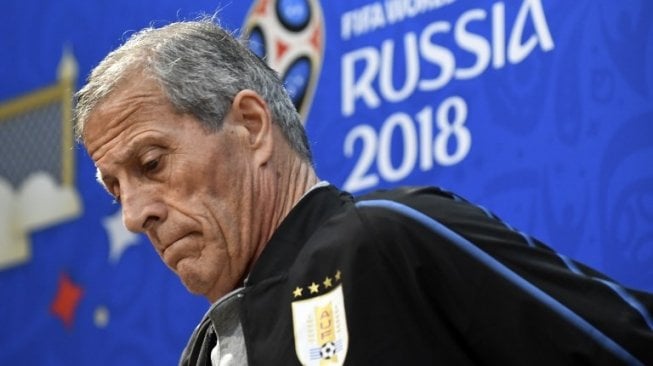 Pelatih Uruguay Oscar Washington Tabarez saat jumpa pers. Martin BERNETTI / AFP 