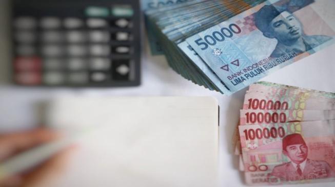 Rupiah Berhasil 'Lari' dari Rp14.600/USD