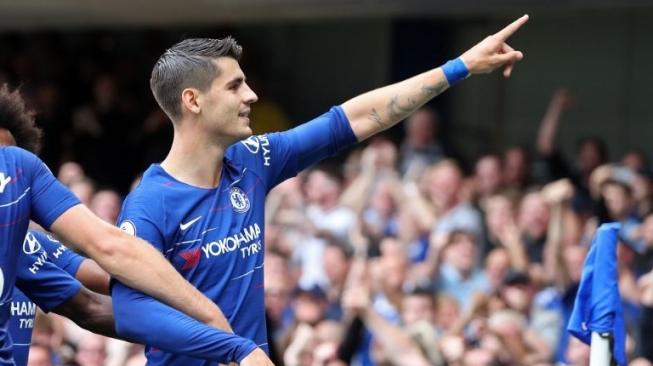 Striker Chelsea asal Spanyol Alvaro Morata merayakan golnya ke gawang Arsenal di Stamford Bridge, London. Daniel LEAL-OLIVAS / AFP