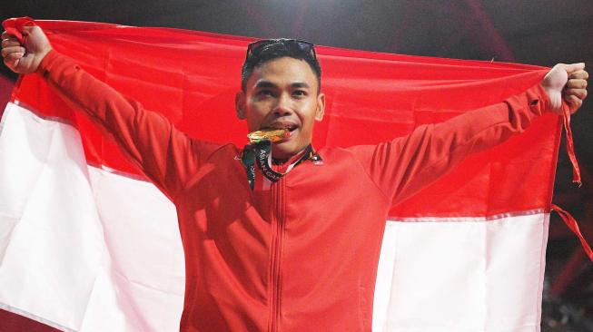 Selain Raih Emas, Eko Yuli Irawan Juga Pecahkan Dua Rekor Dunia