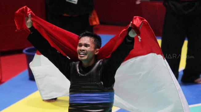 Abdul Malik menang dengan skor 5-0 dan berhasil menyumbangkan emas ke-20 untuk Indonesia.(Suara.com/Oke Dwi Atmaja).