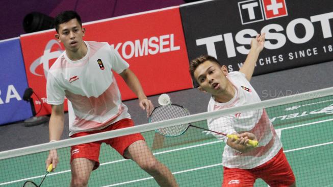 Marcus/Kevin berhasil meraih medali emas usai mengalahkan pebulutangkis ganda putra Indonesia Fajar Alfian/Muhammad Rian Ardianto dengan skor 13-21, 21-18, dan 24-22.(Suara.com/Oke Dwi Atmaja).